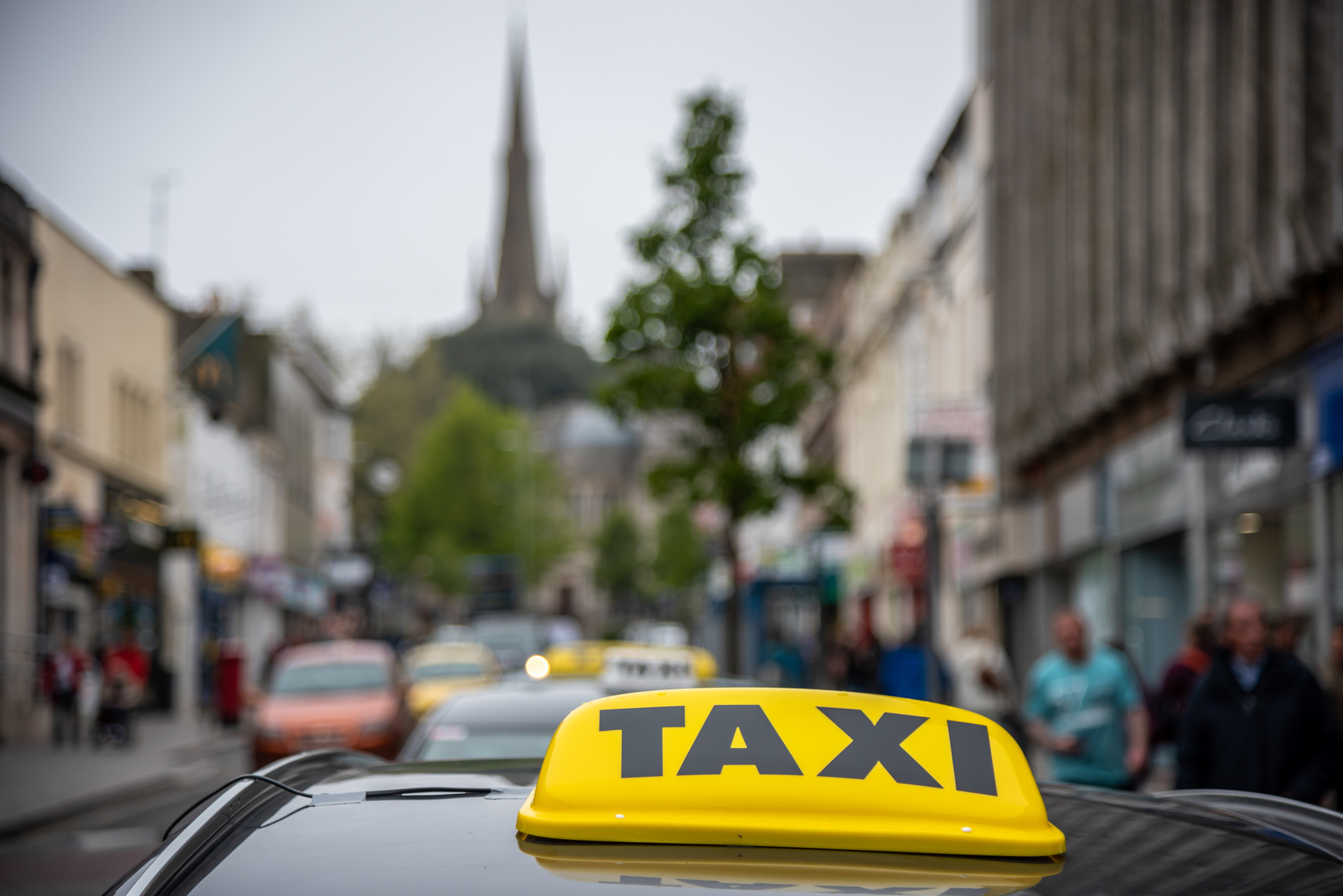 A taxi parked in a car park in Clonmel